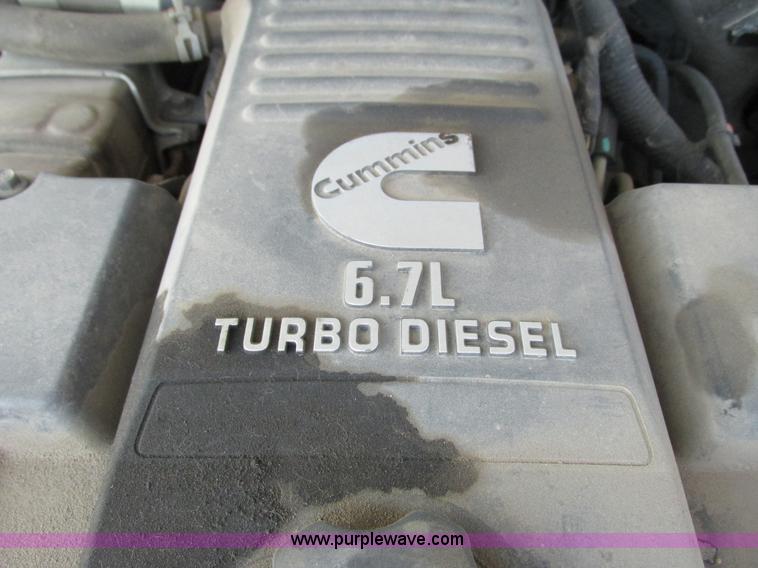 image for item L2631 2011 Dodge Ram 3500 Crew Cab flatbed pickup truck