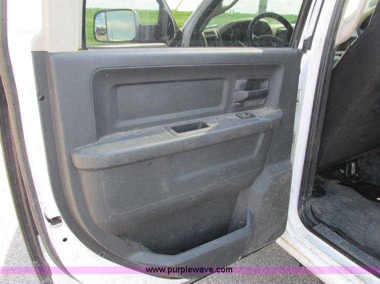 image for item L2631 2011 Dodge Ram 3500 Crew Cab flatbed pickup truck