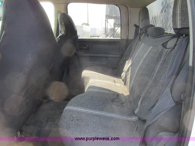 image for item L2631 2011 Dodge Ram 3500 Crew Cab flatbed pickup truck