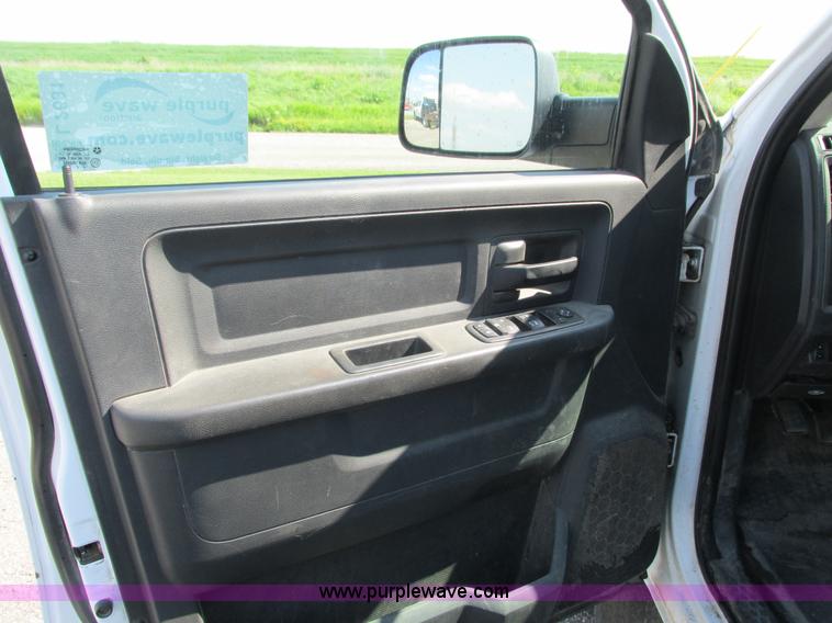 image for item L2631 2011 Dodge Ram 3500 Crew Cab flatbed pickup truck