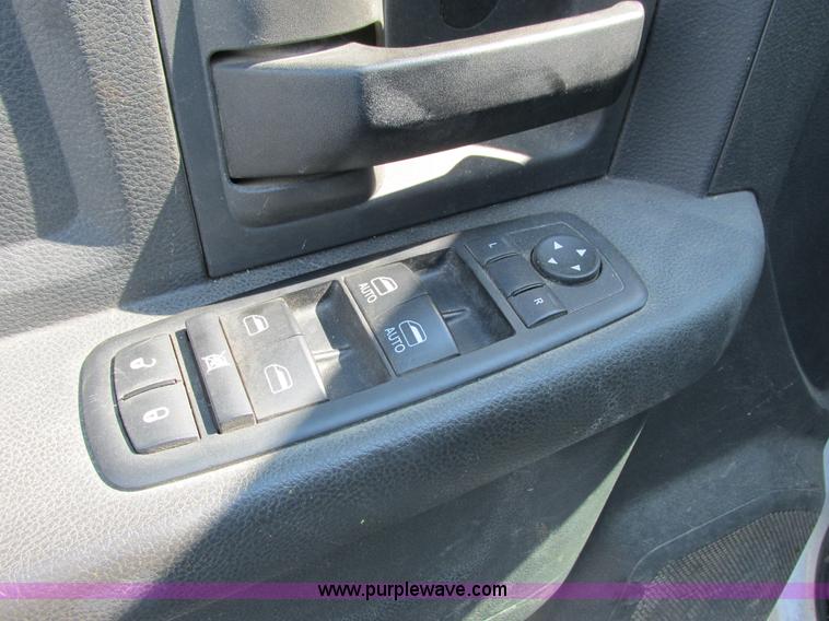 image for item L2631 2011 Dodge Ram 3500 Crew Cab flatbed pickup truck