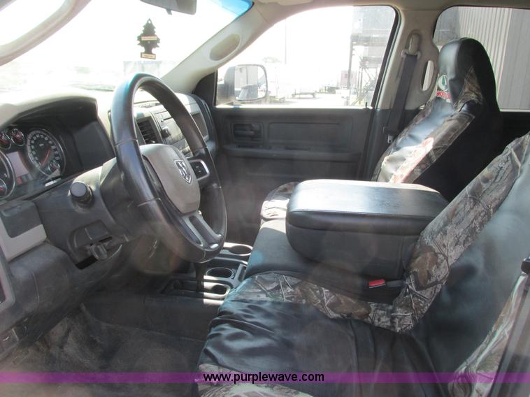 image for item L2631 2011 Dodge Ram 3500 Crew Cab flatbed pickup truck