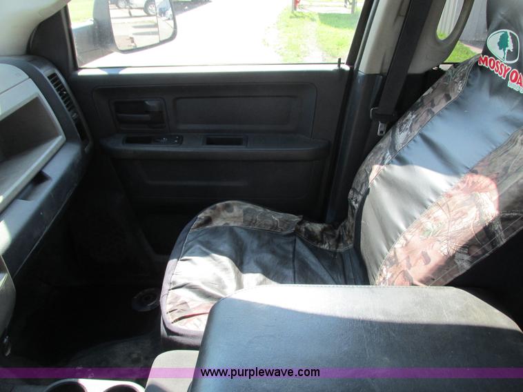 image for item L2631 2011 Dodge Ram 3500 Crew Cab flatbed pickup truck