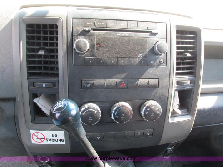 image for item L2631 2011 Dodge Ram 3500 Crew Cab flatbed pickup truck