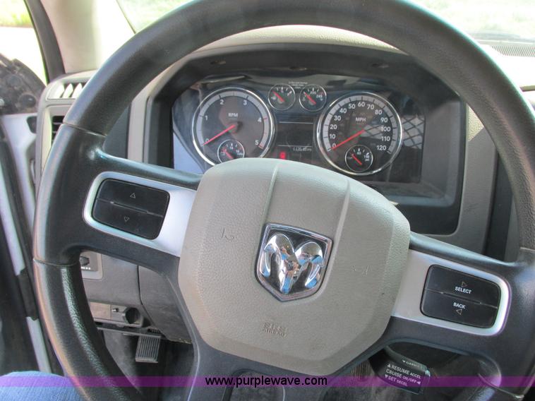 image for item L2631 2011 Dodge Ram 3500 Crew Cab flatbed pickup truck