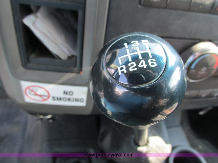 image for item L2631 2011 Dodge Ram 3500 Crew Cab flatbed pickup truck