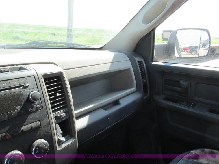 image for item L2631 2011 Dodge Ram 3500 Crew Cab flatbed pickup truck