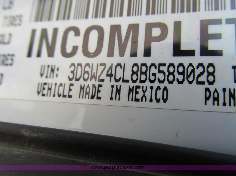 image for item L2631 2011 Dodge Ram 3500 Crew Cab flatbed pickup truck