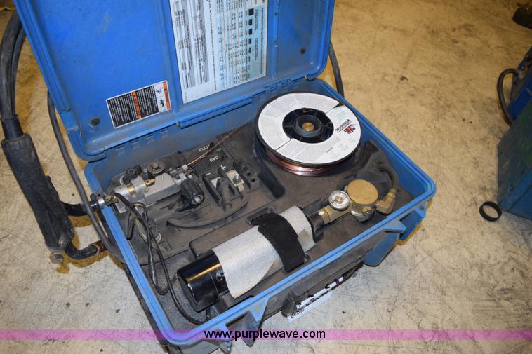 image for item L2648 Miller suitcase wire welder