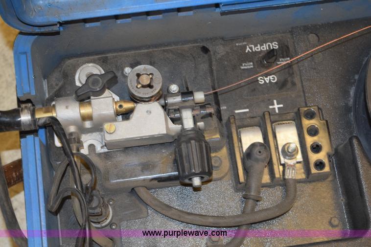 image for item L2648 Miller suitcase wire welder