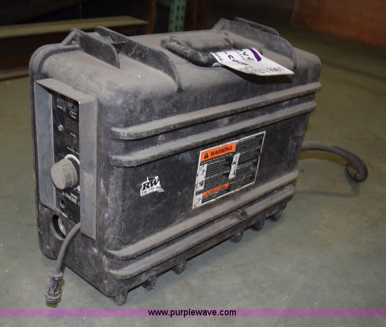 image for item L3361 Miller X-treme 12VS suitcase wire welder
