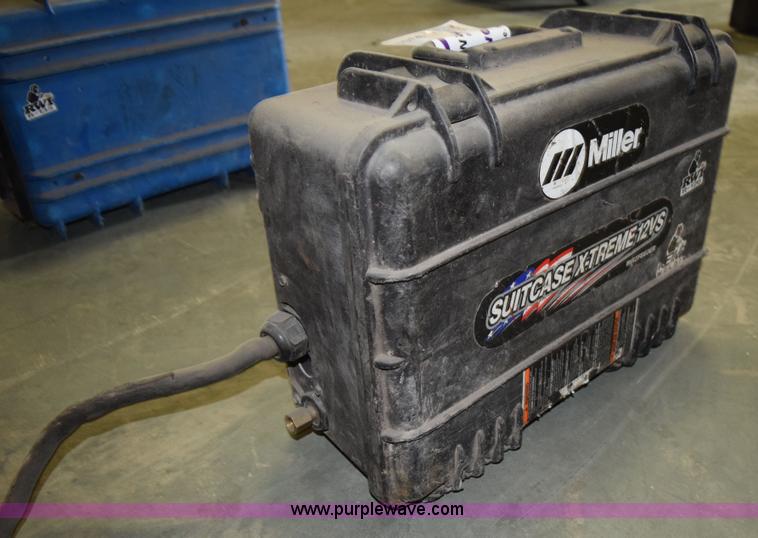 image for item L3361 Miller X-treme 12VS suitcase wire welder