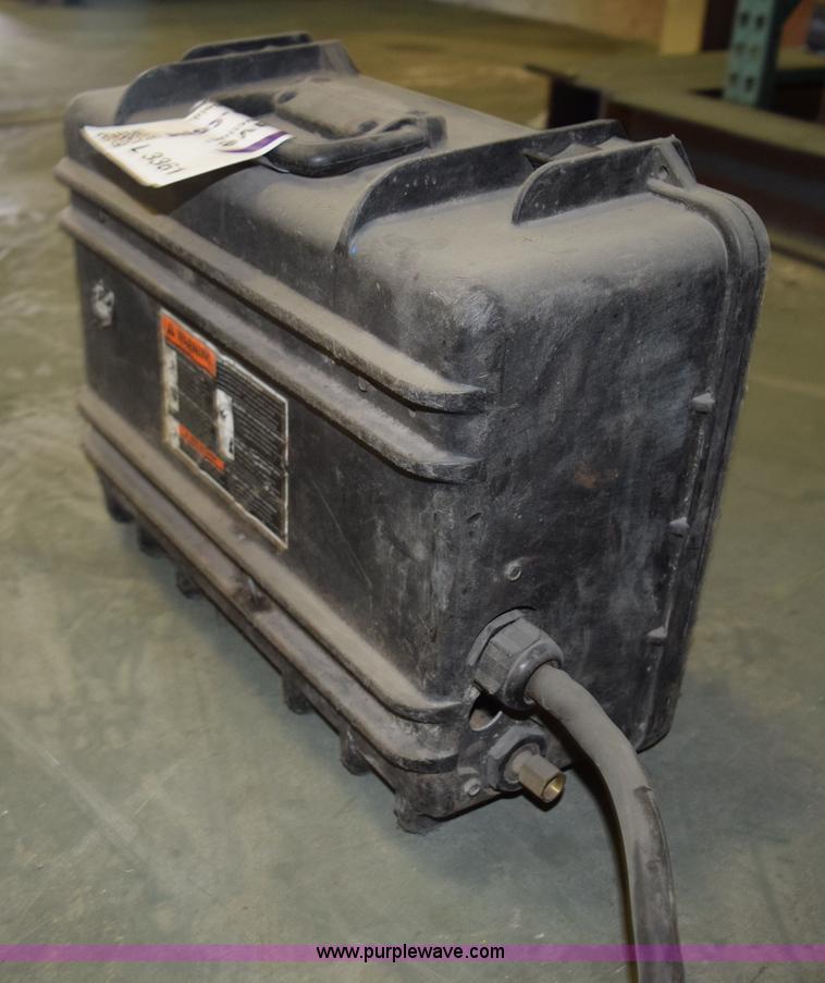 image for item L3361 Miller X-treme 12VS suitcase wire welder