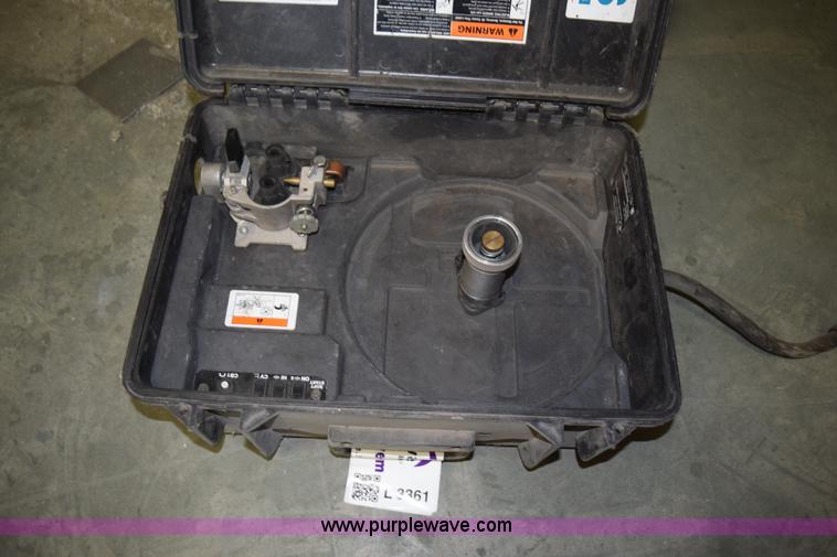 image for item L3361 Miller X-treme 12VS suitcase wire welder