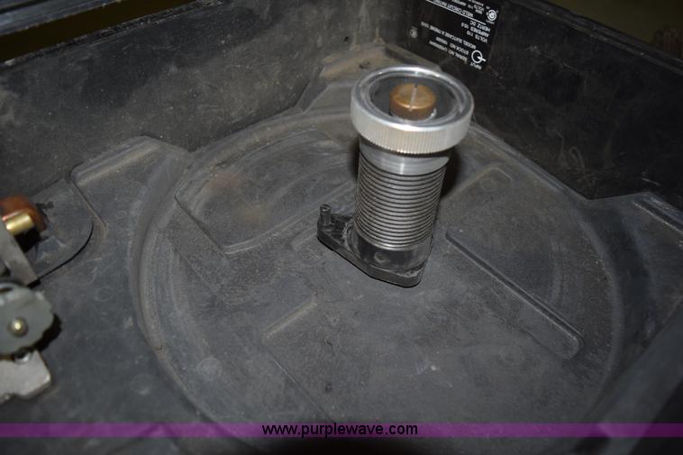 image for item L3361 Miller X-treme 12VS suitcase wire welder