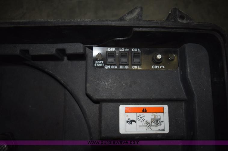image for item L3361 Miller X-treme 12VS suitcase wire welder