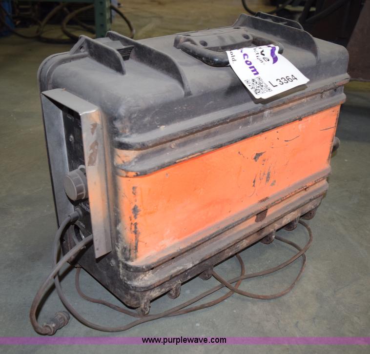 image for item L3364 Miller X-treme 12VS suitcase wire welder