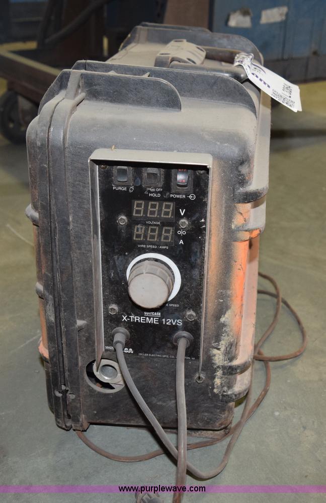 image for item L3364 Miller X-treme 12VS suitcase wire welder