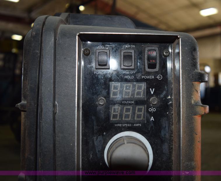 image for item L3364 Miller X-treme 12VS suitcase wire welder
