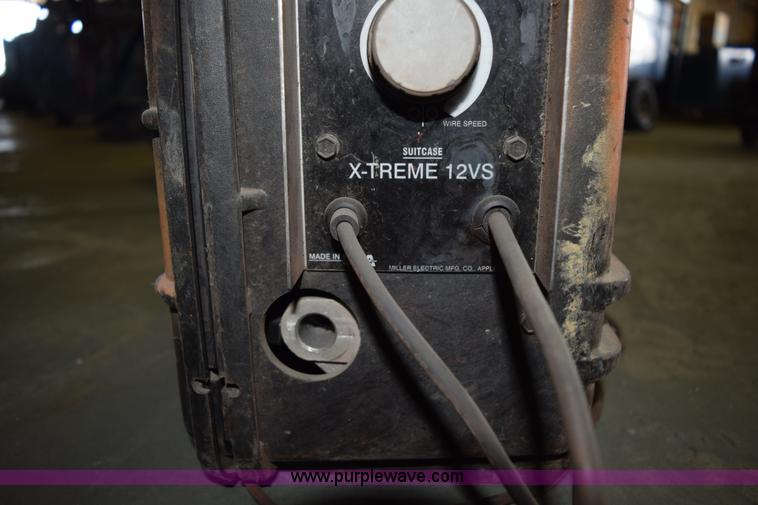 image for item L3364 Miller X-treme 12VS suitcase wire welder