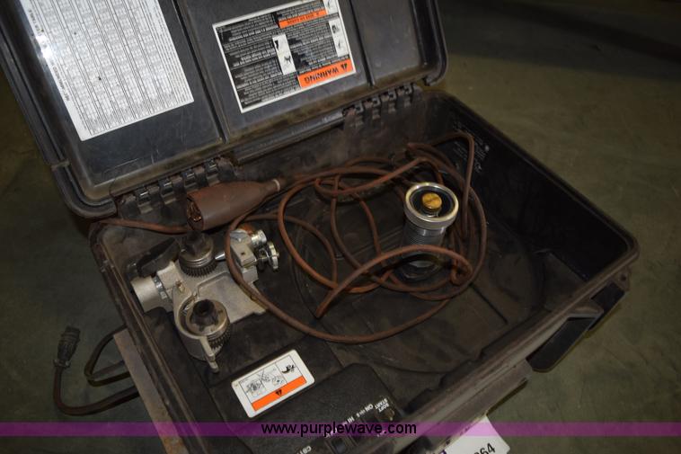 image for item L3364 Miller X-treme 12VS suitcase wire welder