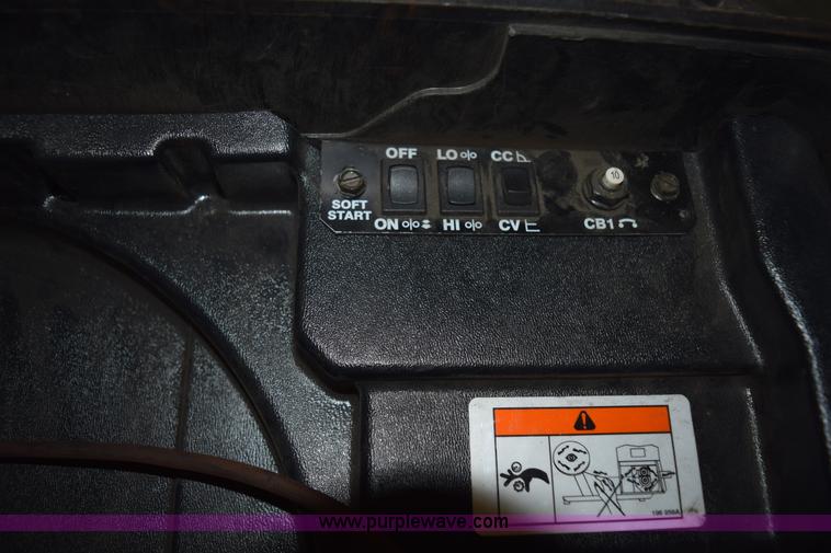 image for item L3364 Miller X-treme 12VS suitcase wire welder