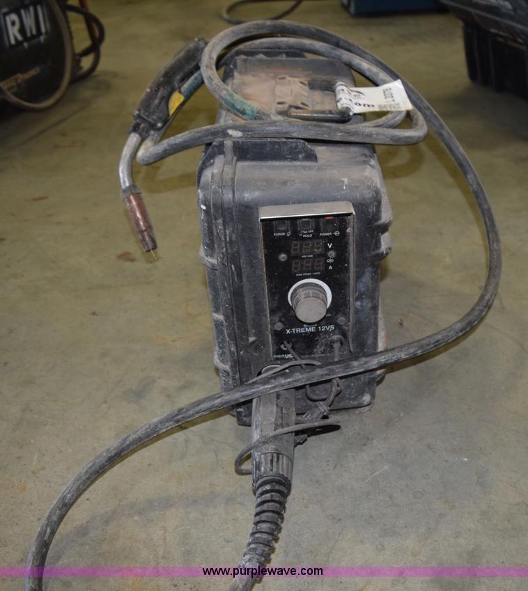 image for item L3378 Miller X-treme 12VS suitcase welder