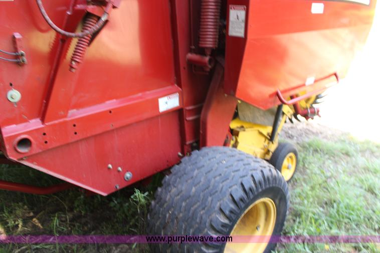 image for item F7990 2004 New Holland BR780 round baler