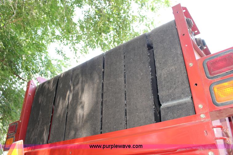 image for item F7990 2004 New Holland BR780 round baler