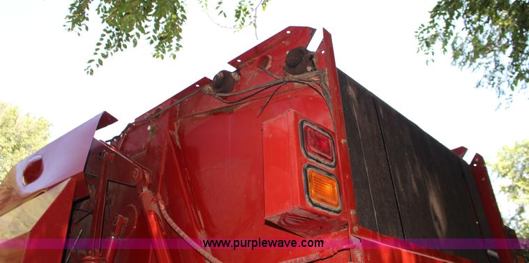 image for item F7990 2004 New Holland BR780 round baler