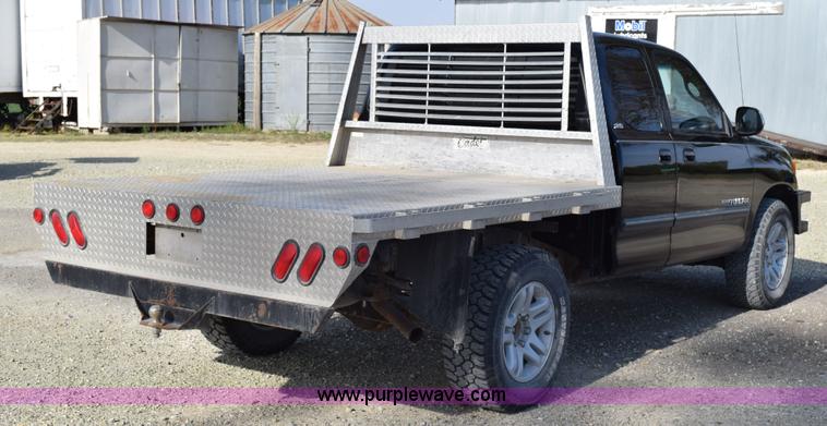 image for item H5119 2003 Toyota Tundra SR5 Access Cab flatbed pickup truck