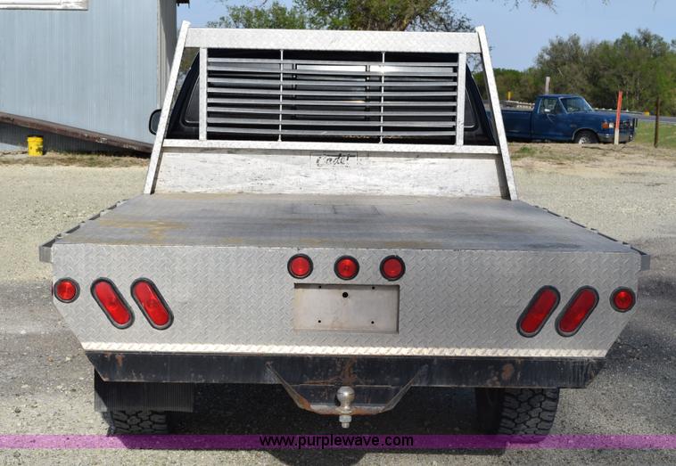image for item H5119 2003 Toyota Tundra SR5 Access Cab flatbed pickup truck