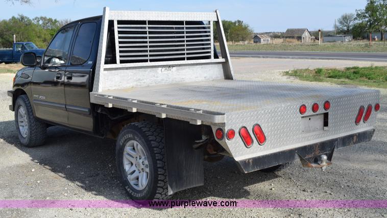 image for item H5119 2003 Toyota Tundra SR5 Access Cab flatbed pickup truck