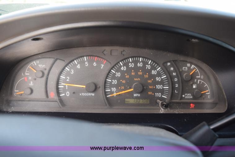 image for item H5119 2003 Toyota Tundra SR5 Access Cab flatbed pickup truck