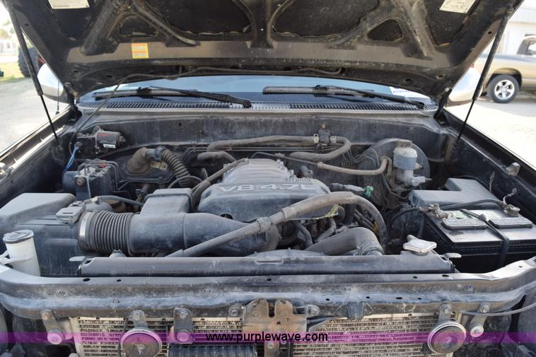 image for item H5119 2003 Toyota Tundra SR5 Access Cab flatbed pickup truck