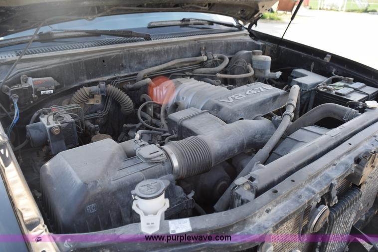 image for item H5119 2003 Toyota Tundra SR5 Access Cab flatbed pickup truck