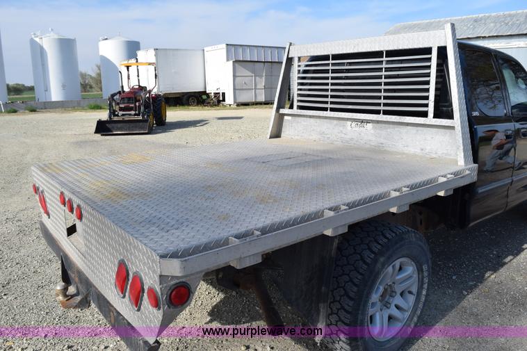 image for item H5119 2003 Toyota Tundra SR5 Access Cab flatbed pickup truck