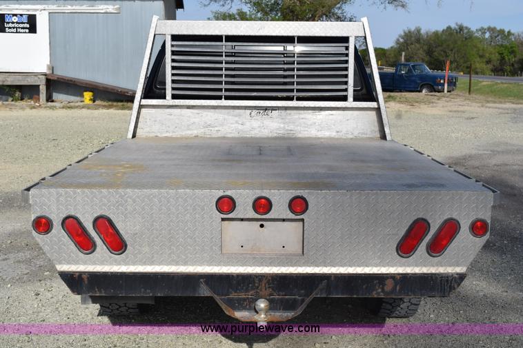 image for item H5119 2003 Toyota Tundra SR5 Access Cab flatbed pickup truck