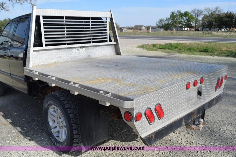 image for item H5119 2003 Toyota Tundra SR5 Access Cab flatbed pickup truck