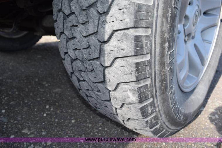 image for item H5119 2003 Toyota Tundra SR5 Access Cab flatbed pickup truck