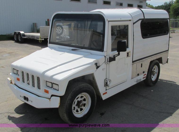 image for item J1762 2009 E-Ride Industries electric utility cart