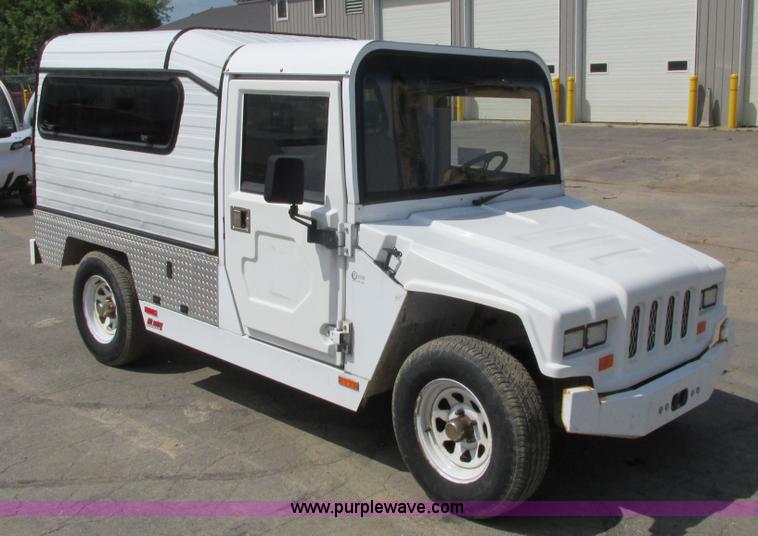 image for item J1762 2009 E-Ride Industries electric utility cart