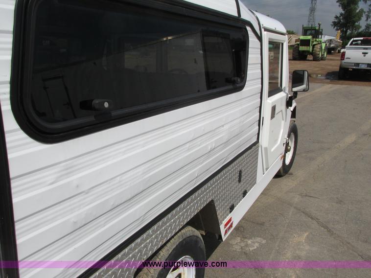 image for item J1762 2009 E-Ride Industries electric utility cart