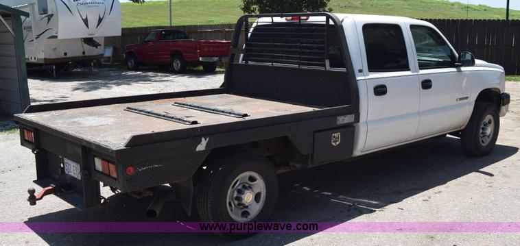 image for item L2708 2005 Chevrolet Silverado 2500HD Crew Cab flatbed pickup truck