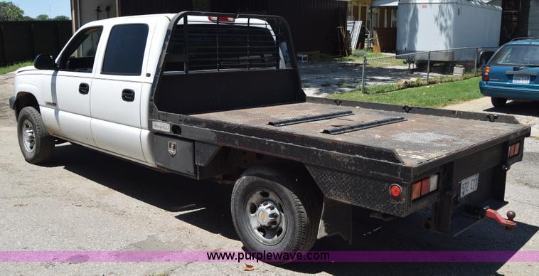 image for item L2708 2005 Chevrolet Silverado 2500HD Crew Cab flatbed pickup truck