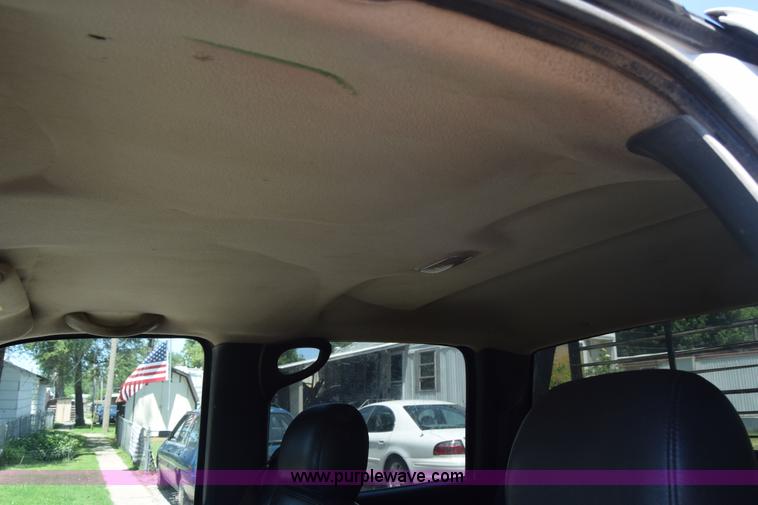 image for item L2708 2005 Chevrolet Silverado 2500HD Crew Cab flatbed pickup truck