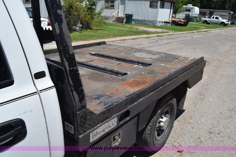 image for item L2708 2005 Chevrolet Silverado 2500HD Crew Cab flatbed pickup truck