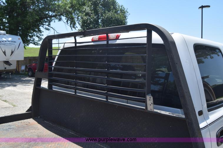 image for item L2708 2005 Chevrolet Silverado 2500HD Crew Cab flatbed pickup truck