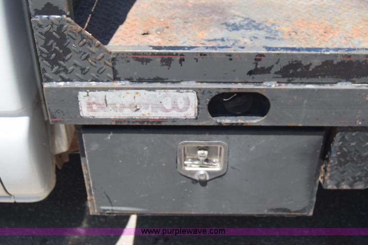 image for item L2708 2005 Chevrolet Silverado 2500HD Crew Cab flatbed pickup truck