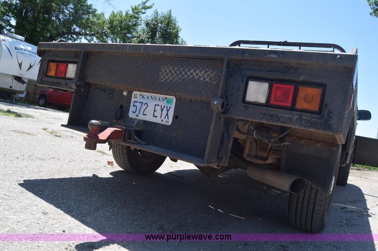 image for item L2708 2005 Chevrolet Silverado 2500HD Crew Cab flatbed pickup truck